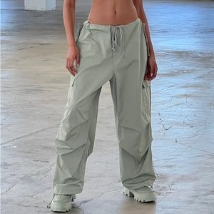 Local European “sage” green parachute pants